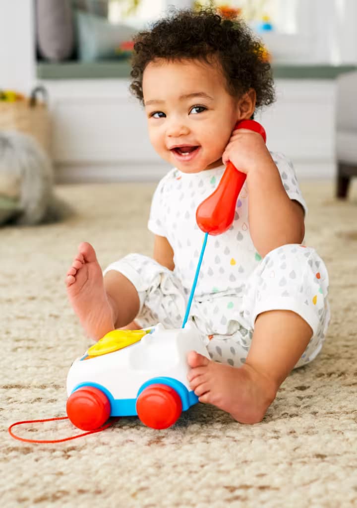 Juguete de Arrastre para Bebés y Niños Pequeños Teléfono Fisher-Price Chatter Telephone con Disco Giratorio