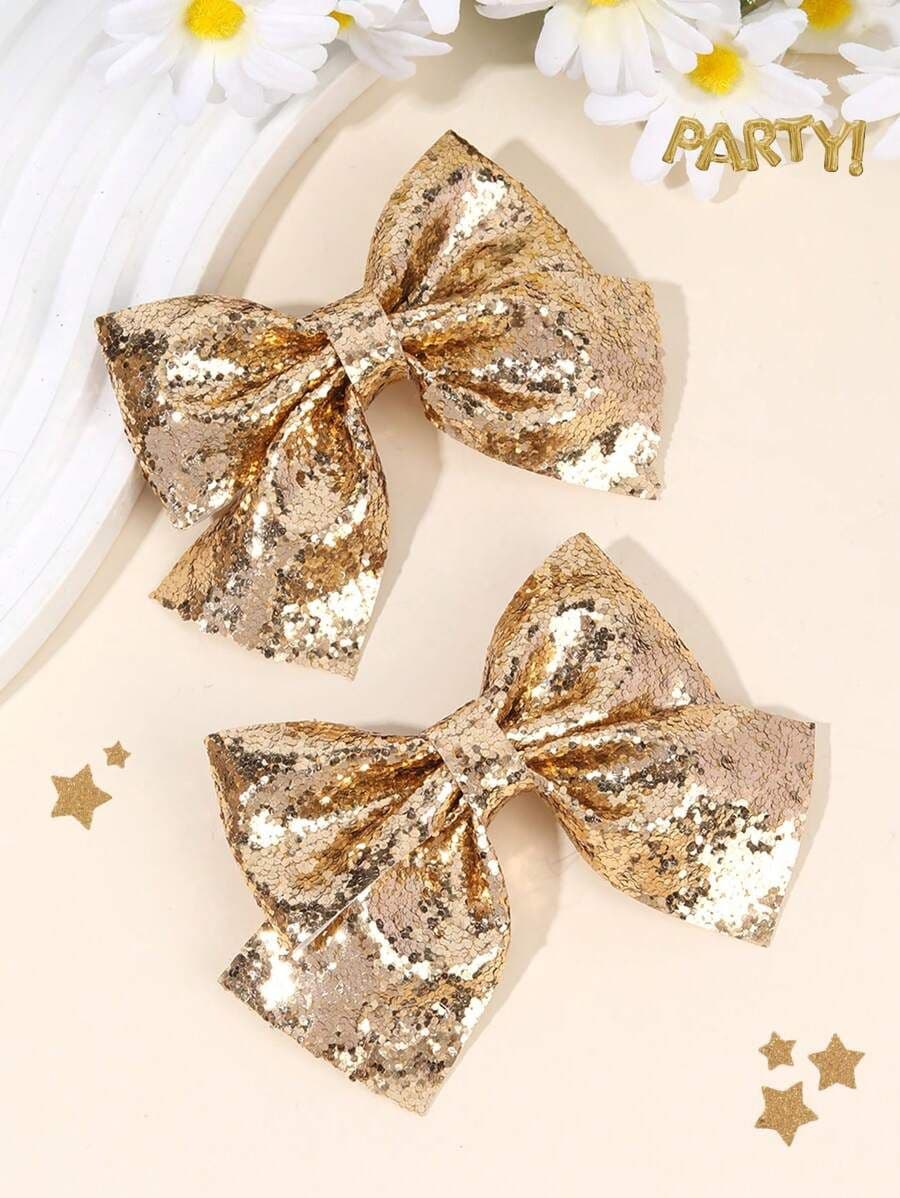 Set de 2 Lazos Brillantes con Lentejuelas Doradas para Niñas – Ganchos Tipo Alligator